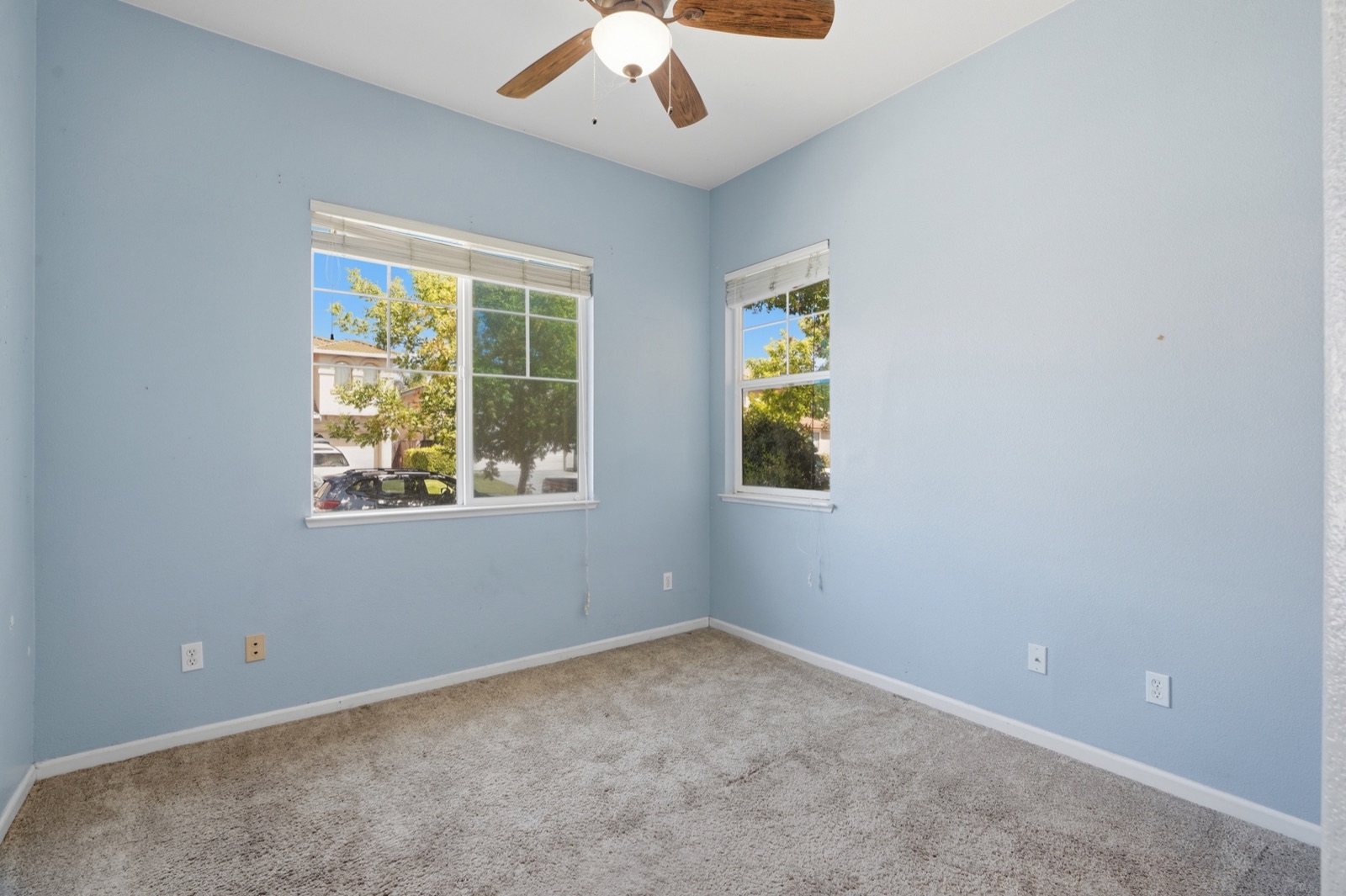 Bedroom with two windows